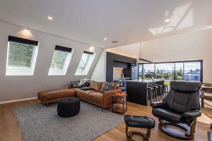 A three-bedroom A-frame chalet is up for grabs at 21 Findlay Street, in National Park, Ruapehu. Photo / Supplied