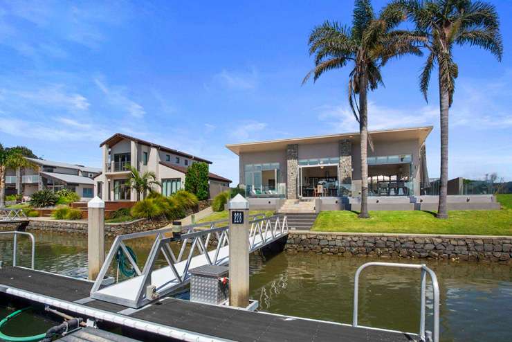 This five-bedroom beach home on Prescott Place, in Pauanui, Thames-Coromandel, was snapped up by out-of-town buyers. Photo / Supplied