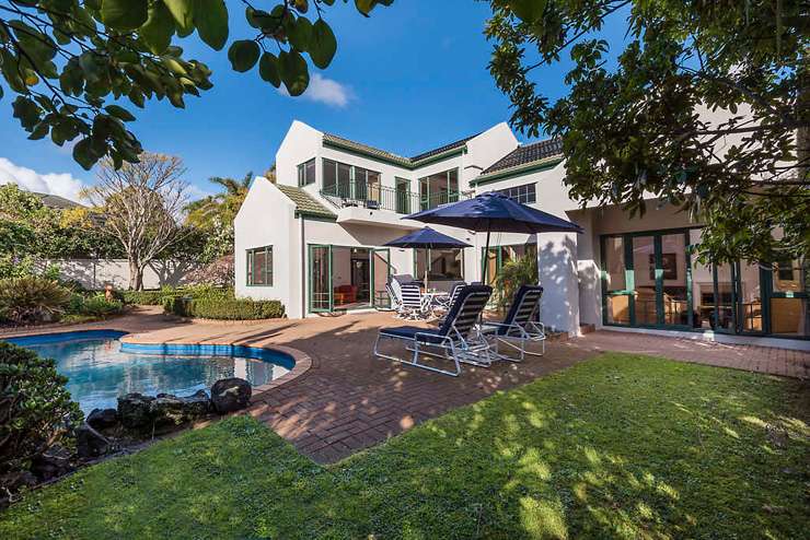 white and timber modern house with pool in front 8 Saint Elmo Rise, Shamrock Park, Dannemora, Auckland