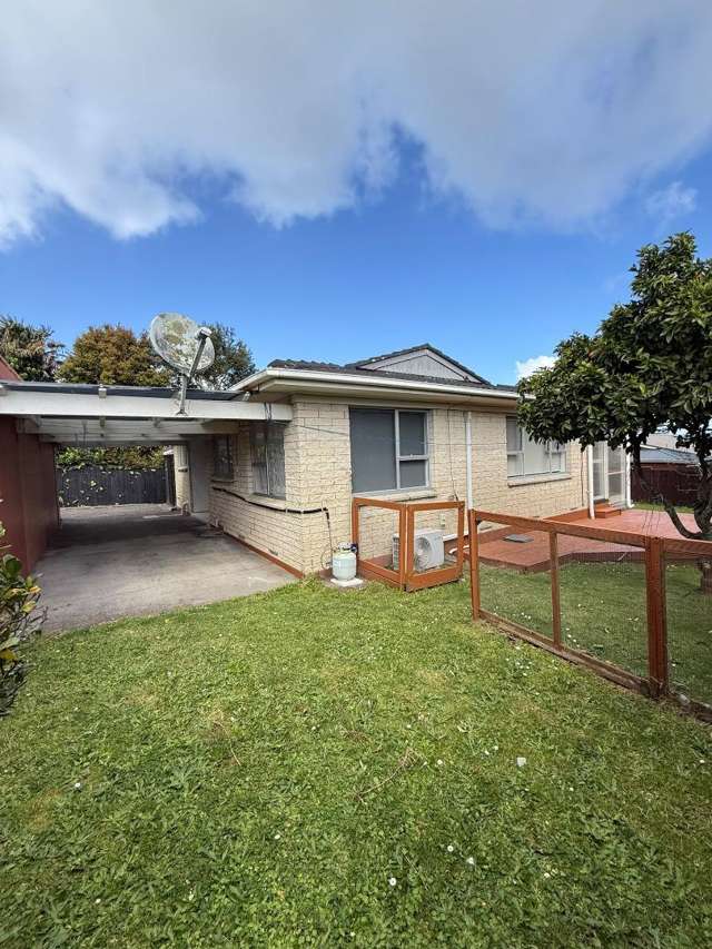 Charming 2 Bedroom Brick and Tile Home with Large Backyard