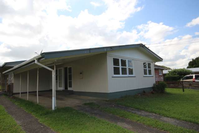 2 bedroom front unit with carport