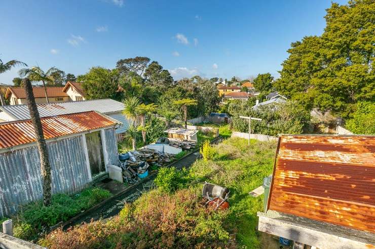 old house with rusty roof and overgrown lawn  21 Johnstone Street, Point Chevalier, Auckland