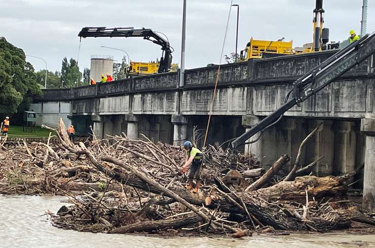 Cars underwater in Auckland after heavy rain causes extensive flooding and destruction in 2021. Photo / Getty Images