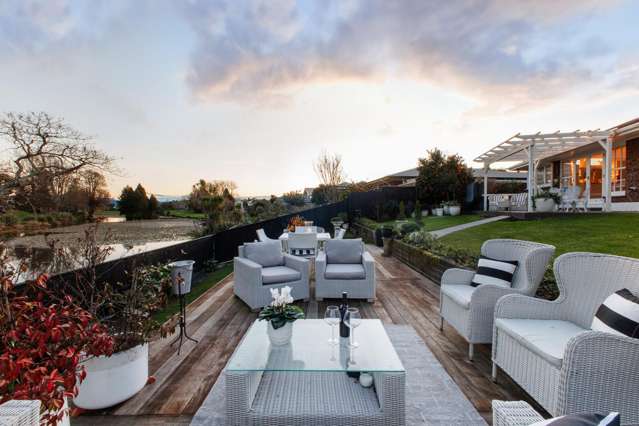 Sun-filled elegance with outstanding lake views!