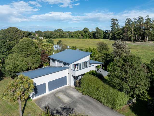 Five Bedrooms, Three Cars, Endless Possibilities