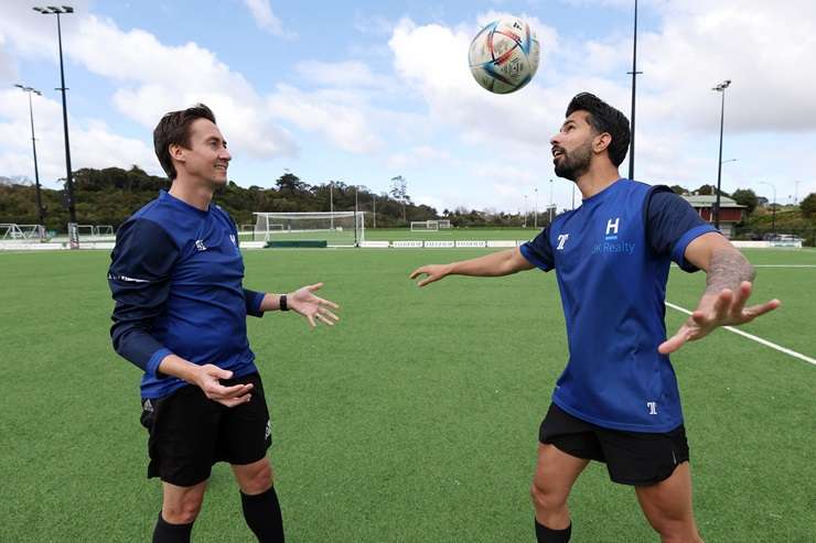 Harcourts JK Realty owner Dave Findlay and Harcourts No.5 agent worldwide Aman Gulia on the pitch. The two met four years ago and have become fast friends. Photo / Fiona Goodall