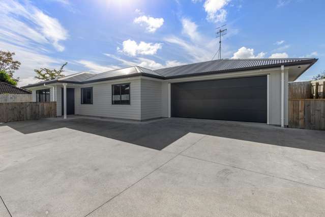 Modern, Low-Maintenance Living + Double Garage!