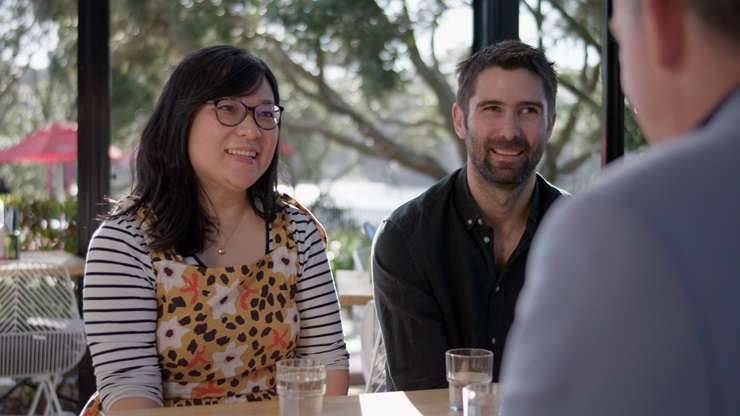 Hosts Jayne Kiely and Paul Glover introduce first-time buyers Adam and Jesz Stokes to what could be their next home. Photo / TVNZ