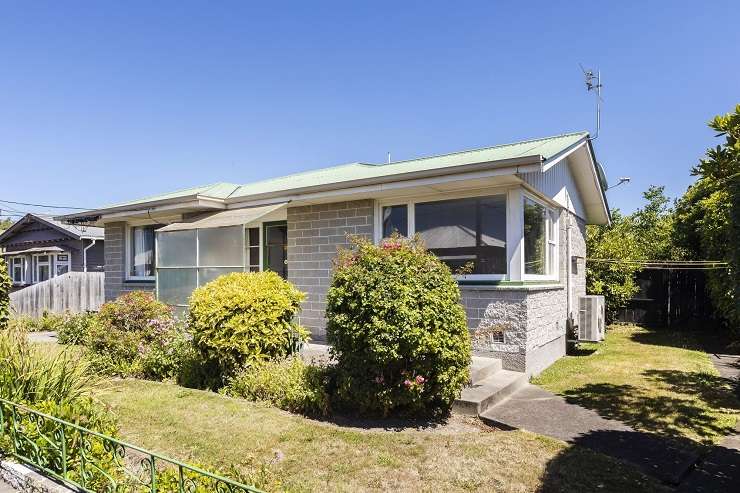 The deadline sale for this two-bedroom unit at 1/30 Collingwood Street, in New Brighton, Christchurch, was brought forward following strong buyer interest. Photo / Supplied