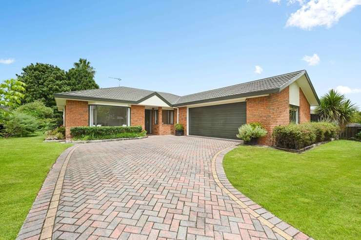 A four-bedroom, two-bathroom brick home on Aquila Crescent, in Flagstaff, recently sold for <img.4m in a competitive auction. Photo / Supplied