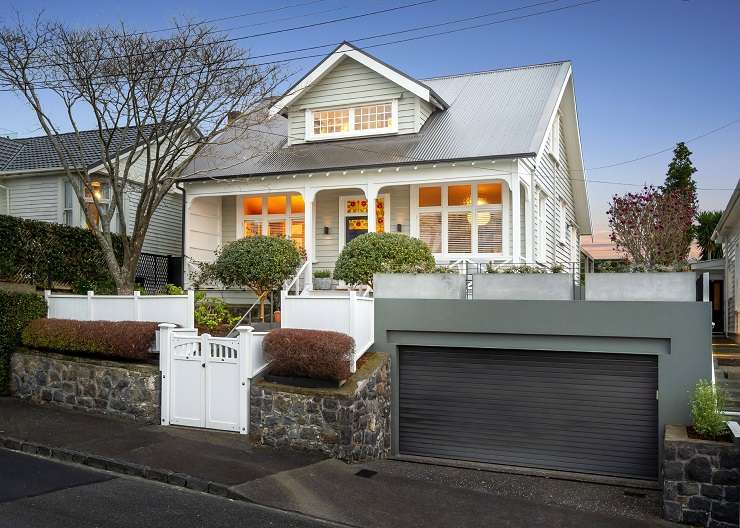 ornate two-storey villa with balcony and brick wall  27 Herne Bay Road, Herne Bay, Auckland