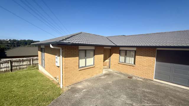 Spacious 4-Bedroom Brick Beauty with Double Garage – Massey