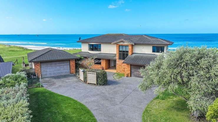 A concrete and glass beach home at Beverley Terrace, in Whangamatā, sold in December. It had a RV of $6.45m. Photo / Supplied