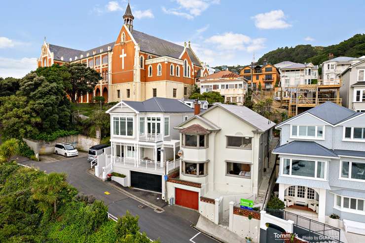 Three of the houses for sale on McFarlane Street, in Mount Victoria, are right next door to each other. Photo / Supplied