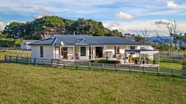 Elevated home and income with sweeping views