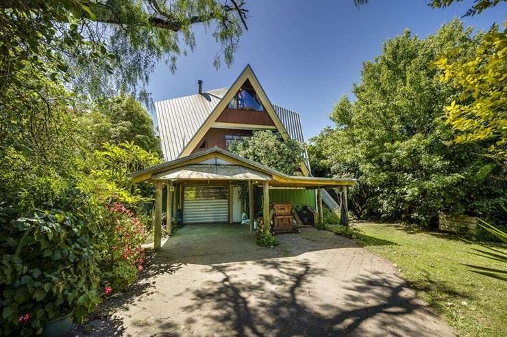 21 Gillies Crescent, left, and neighbouring 37 Gillies Crescent were built by two builder cousins who had a love of quirk.  Photo / Supplied