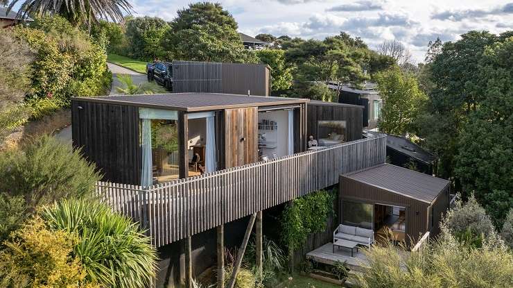 A four-bedroom, three-bathroom home on Hills Road, in Raglan, sold for $2.15m last month, making it the most expensive property to sell in the surf town so far this year. Photo / Supplied