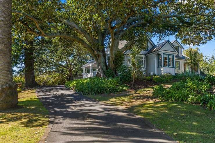 beige villa with brown roof and green lawn 3 Armadale Road, Remuera