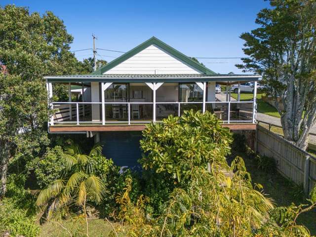 Water Views + Potential = This Will Sell!