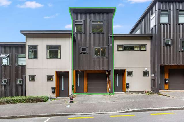 LOW MAINTENANCE. LIKE NEW. GARAGING.