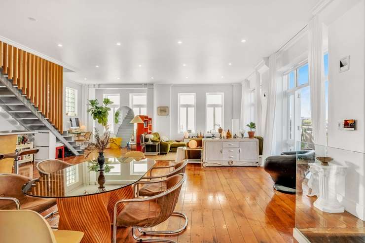 Influencer and designer Ron Goh, aka Mr Cigar, in his apartment on Sale Street, Auckland. Photo / Instagram / mrcigar