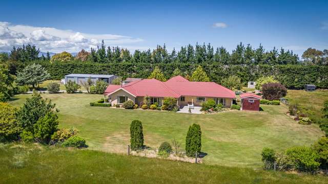 Spacious Home and Land Awaiting New Owners