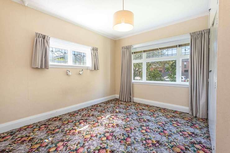 The four-bedroom, one-bathroom 1930s bungalow at 83 Blighs Road, in Strowan, Christchurch, heads to auction next week. Photo / Supplied