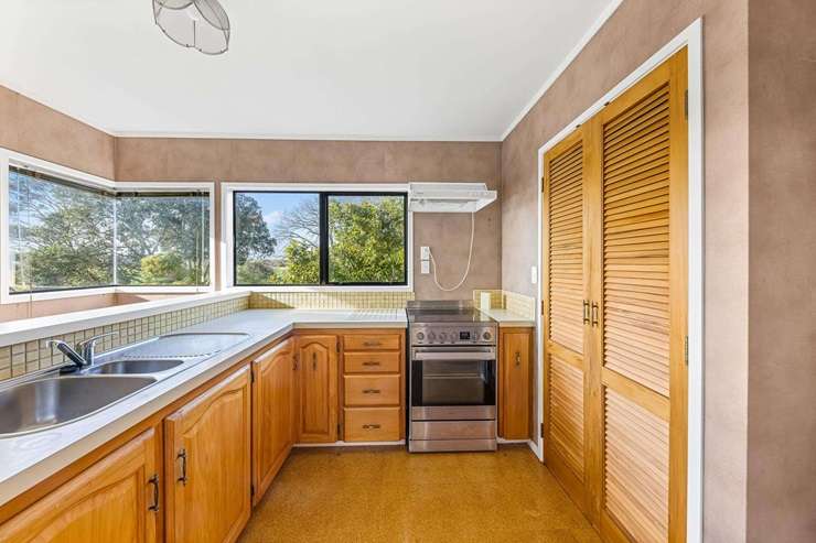 A run-down two-bedroom home on Tui Street, in Point Chevalier, attracted a lot of buyer interest and auction bids. Photo / Supplied