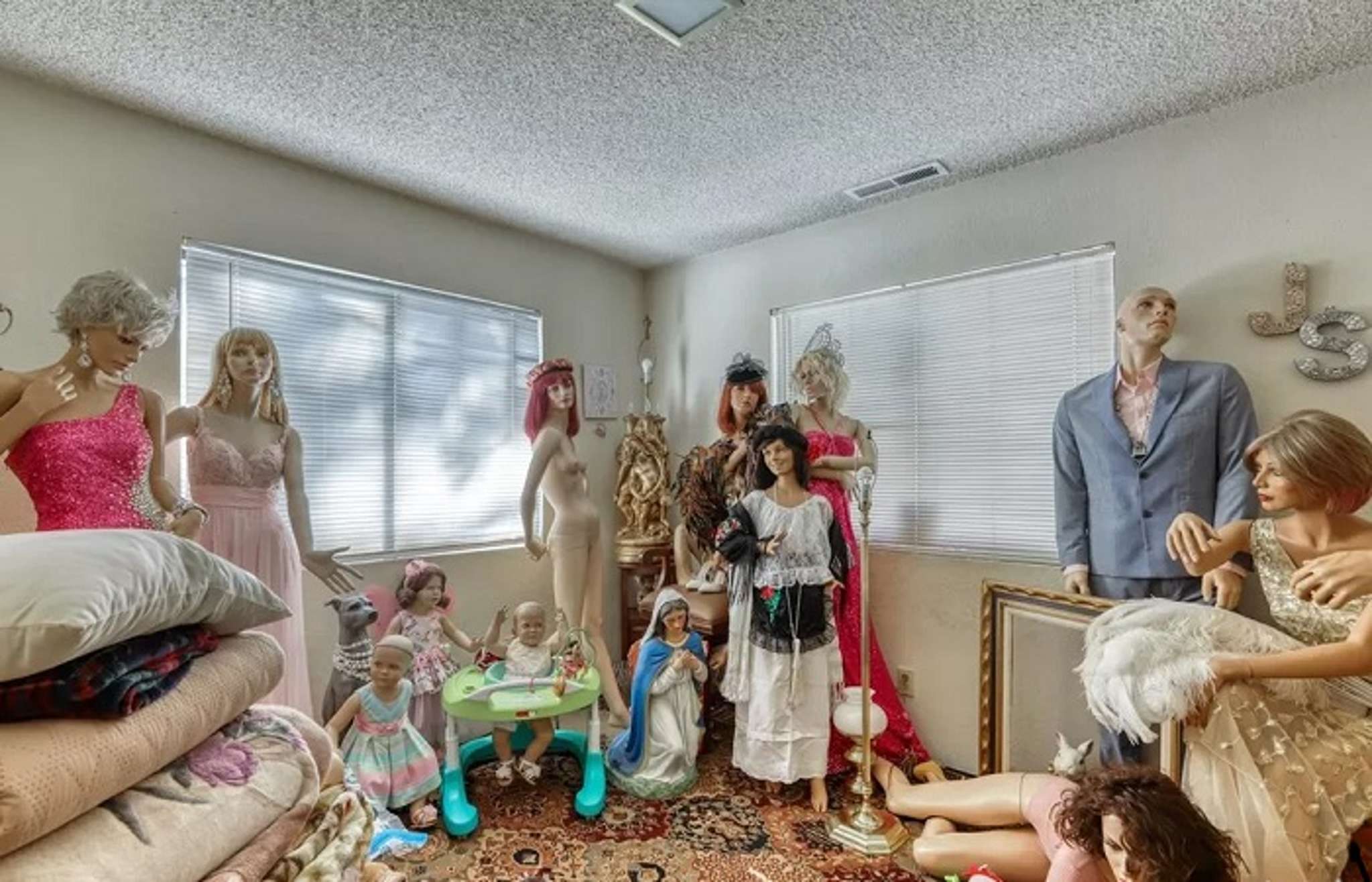 Would you buy a house full of mannequins?