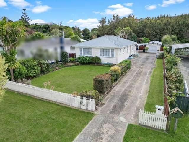 Solid & spacious with garaging to boot!