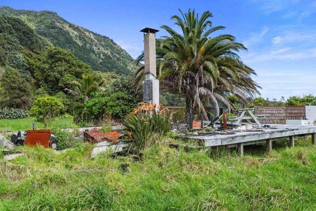 Burnt-down bach in fishing hot spot could be snapped up for less than $400,000