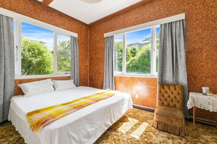 The two-bedroom home at 16 Glenside Road, in Glenside, Wellington, has an RV of $930,000 and sits on 956sqm. Photo / Supplied