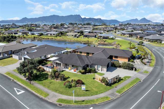 EXCEPTIONAL HOME IN ONE TREE POINT