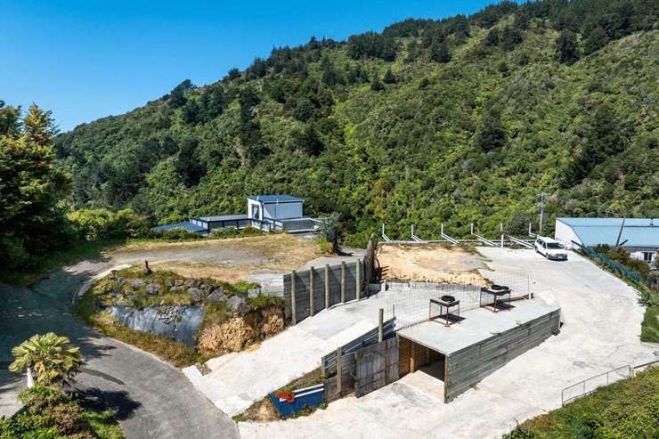 The two-bedroom home at 9 Cooks Ridge, in Waikawa, Marlborough, looks out to Queen Charlotte Sound. Photo / Supplied