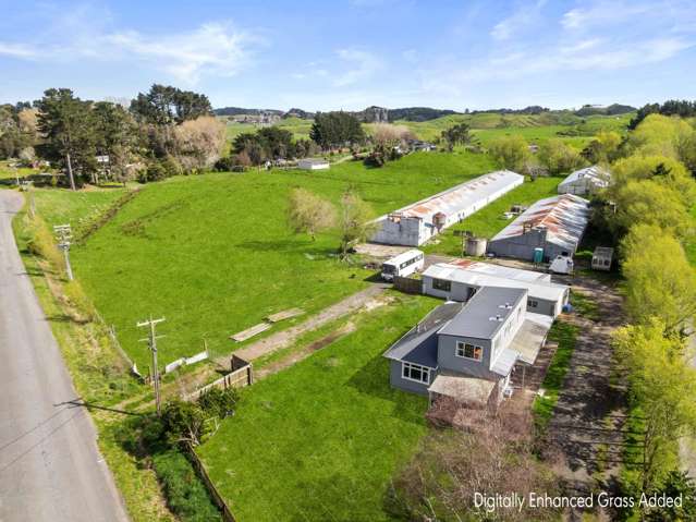 Rural family home with expansive sheds!