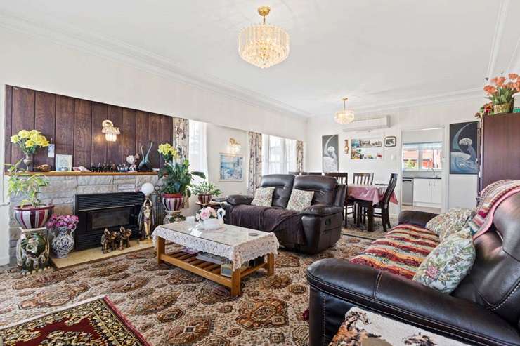 A shabby weatherboard home on Carruth Road, in Papatoetoe, sold for an unexpected <img.72m at auction earlier this month. Photo / Supplied