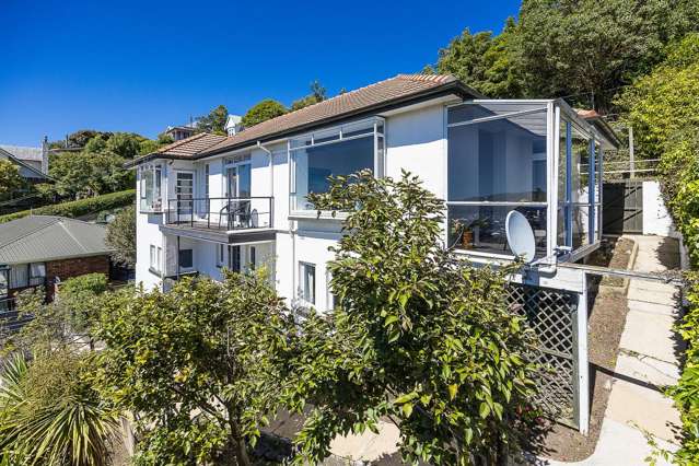 Elevated and Sun-drenched with Grandstand Views