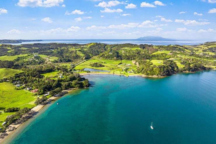 A three-bedroom Lockwood bach at 806 Takatu Road, in Tāwharanui, is one of just a handful still left on the peninsula. Photo / Supplied