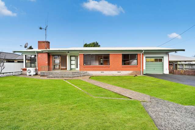 Charming 1960s Brick Home with Endless Potential