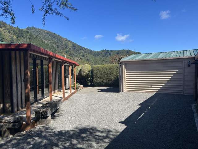 Beautifully Renovated 3-Bedroom Home with Large Deck & Double Garage