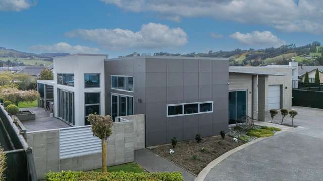Modern Living with Impressive Four-Car Garaging