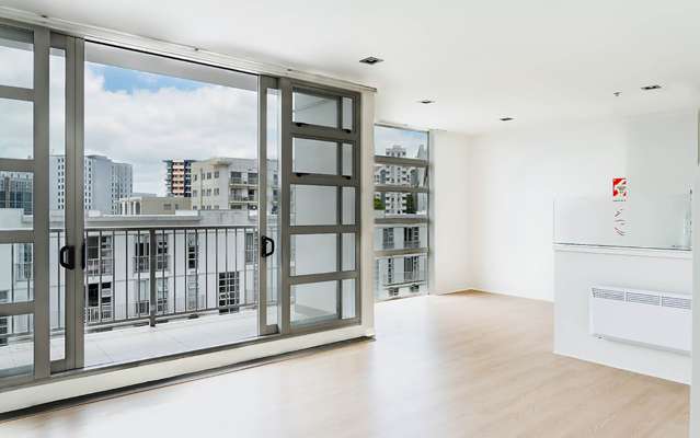 Renovated 2 Bedroom Penthouse with Two Carparks