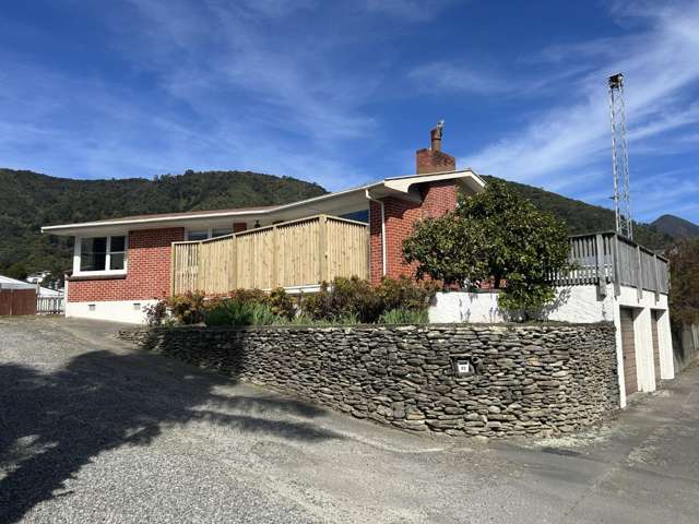 Three-Bedroom Home with Garages