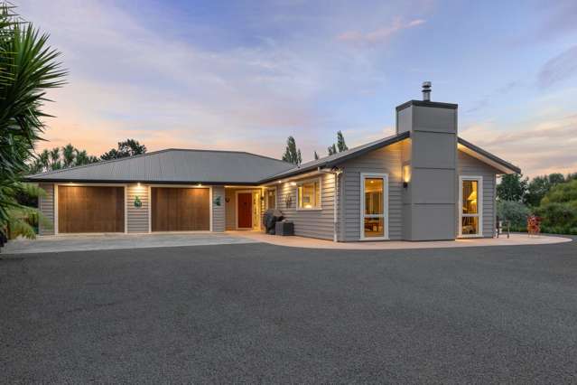 Fabulous home with triple car garaging!