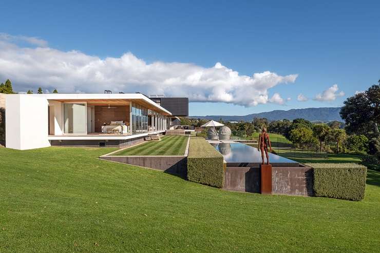 long white and glass house with pool and tennis court in front  340H Pahoia Road, Pahoia Point, Whakamarama, Tauranga