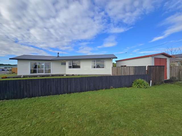 Excellent location - solid home with garaging