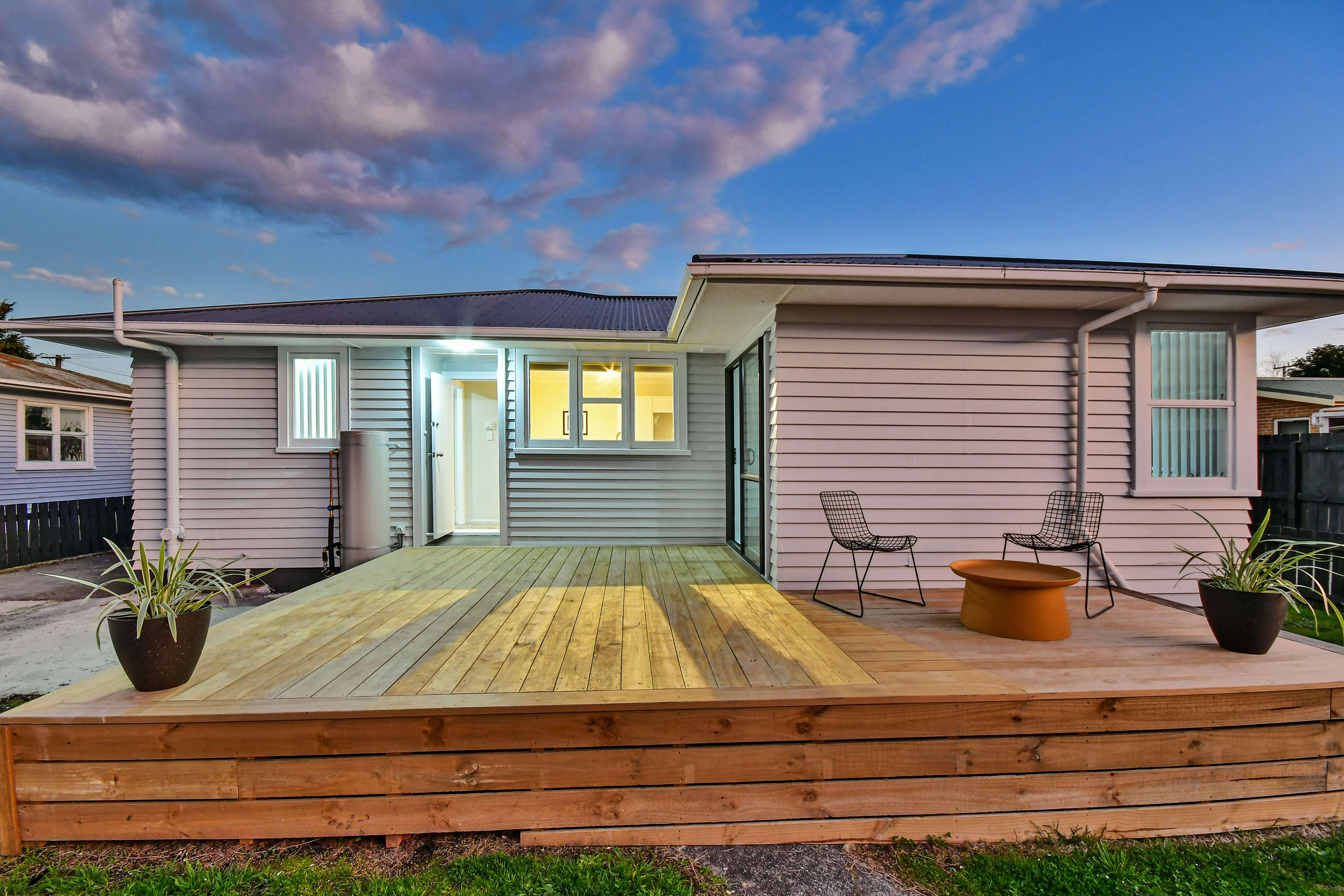 weatherboard house with sunset sky 188 Old Wairoa Road, Papatoetoe, South Auckland