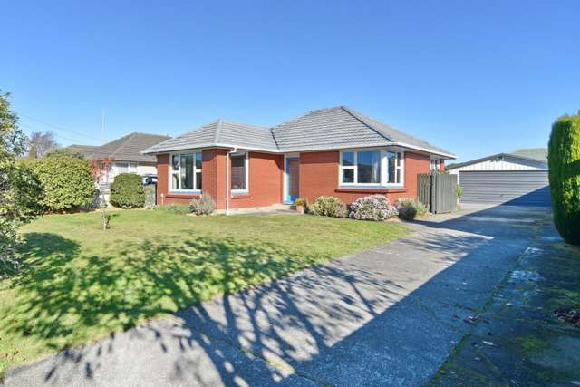 Great Starter With Huge, Four Car Garaging!