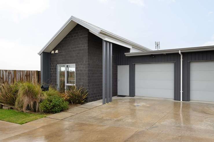 An investor made a cash unconditional offer on a three-bedroom home on Howden Road, Fairfield, in Hamilton, to beat off the intense competition and secure the home. Photo / Supplied