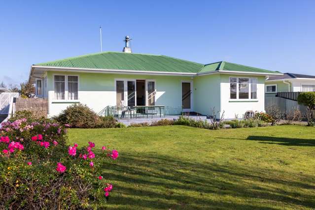 Four bedroom home with development potential!